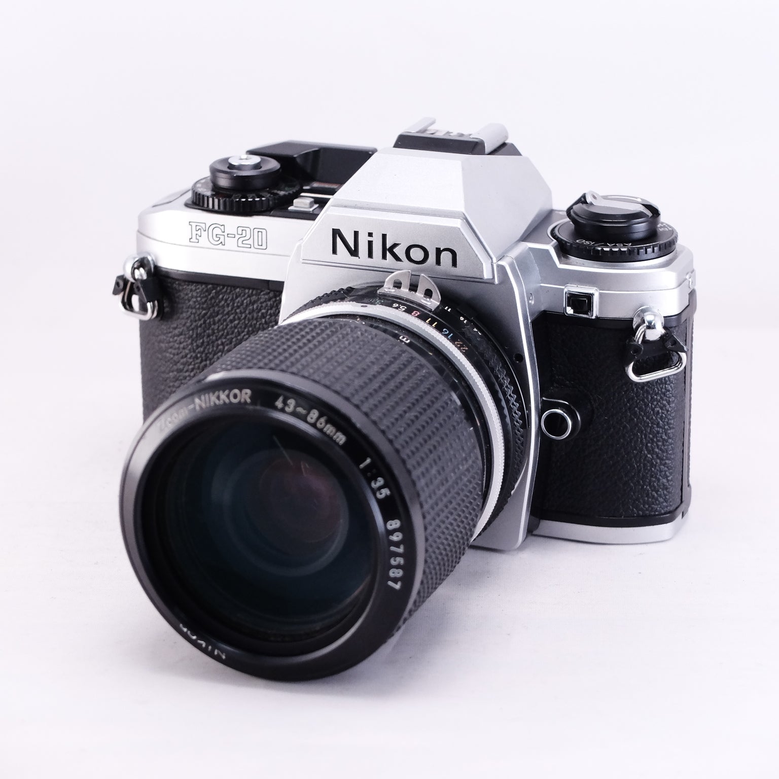 Nikon FG-20 (Silver) + Zoom NIKKOR 43-86/3.5