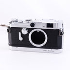 Canon VT deluxe film rangefinder camera with classic design and metal body.