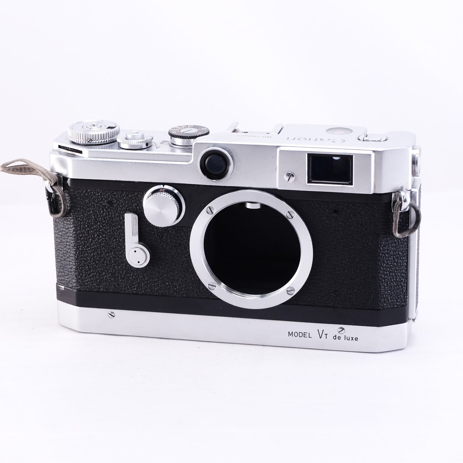 Canon VT deluxe film rangefinder camera with classic design and metal body.