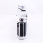 Canon VT deluxe film rangefinder camera, showcasing its sleek side profile and classic design.
