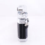 Side view of Canon VT Deluxe film camera showcasing its classic design and controls.