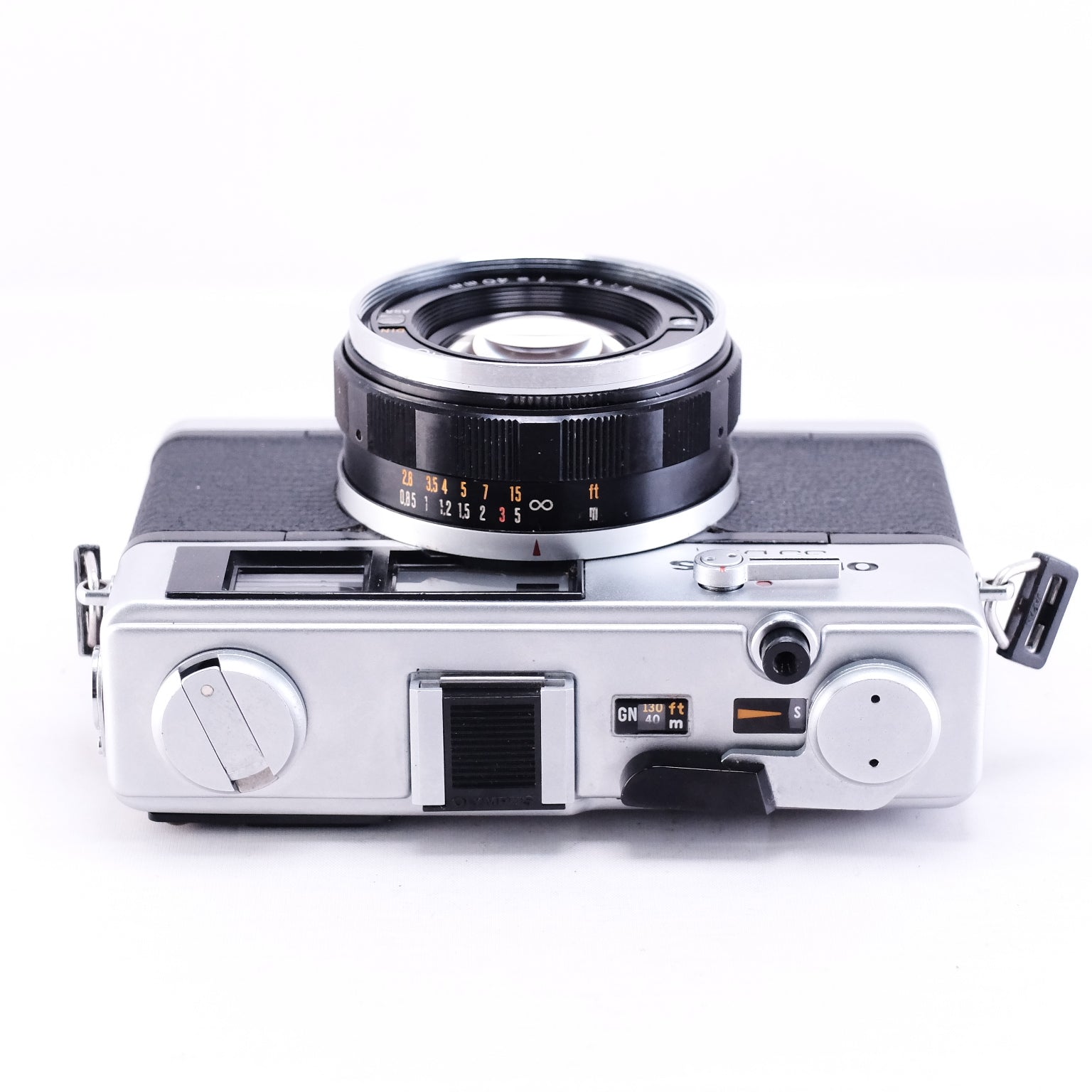 OLYMPUS 35DC film camera in black, top view with lens, vintage design and rangefinder features.